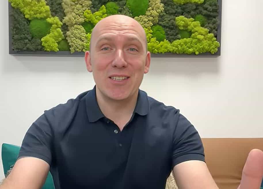 A thumbnail for a customer case study, showing Bob Bailkoski, CEO of Logicalis. There is a play button in the center.